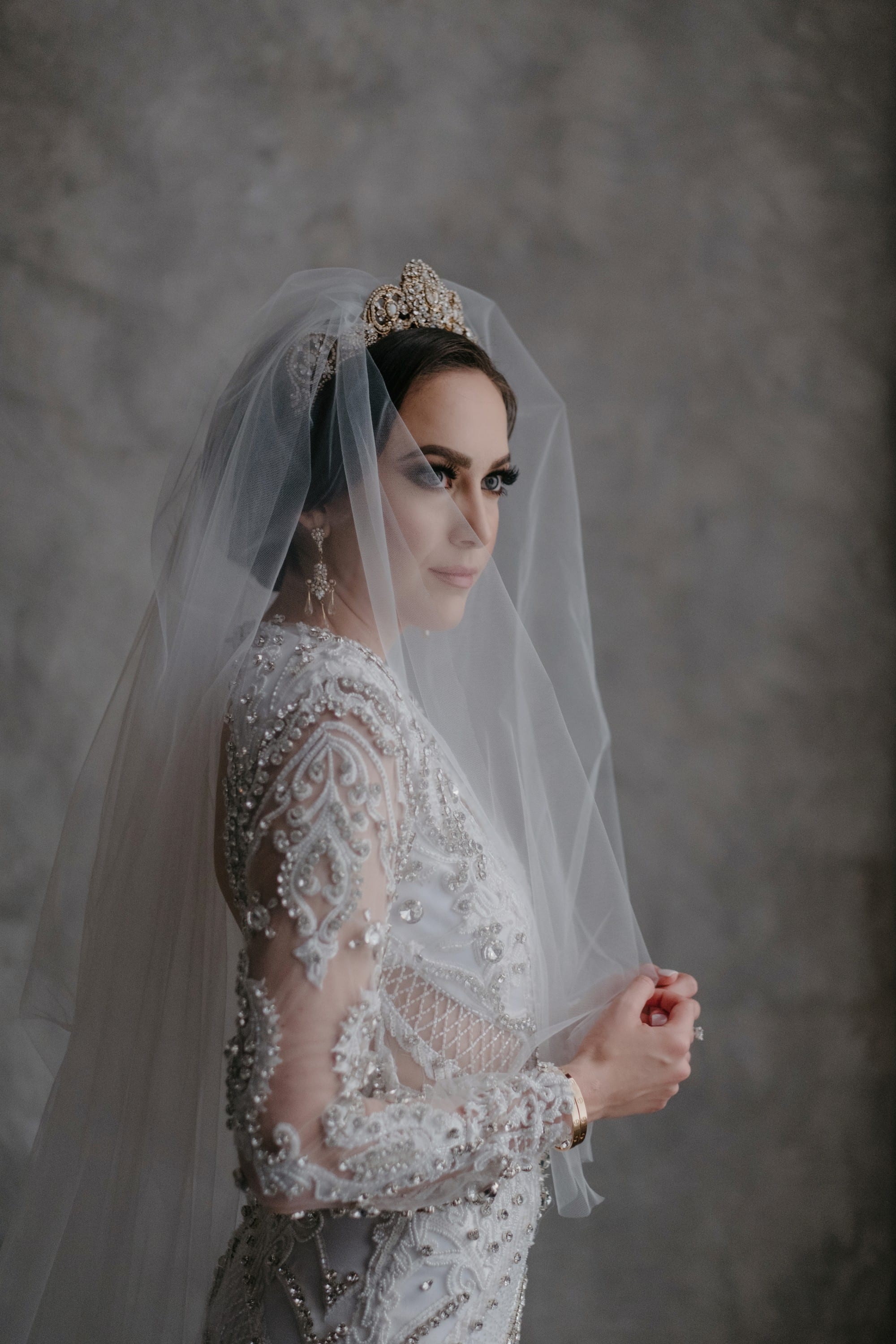 The same bridal portrait before matching: cooler and flatter, the subject identical to the developed version.