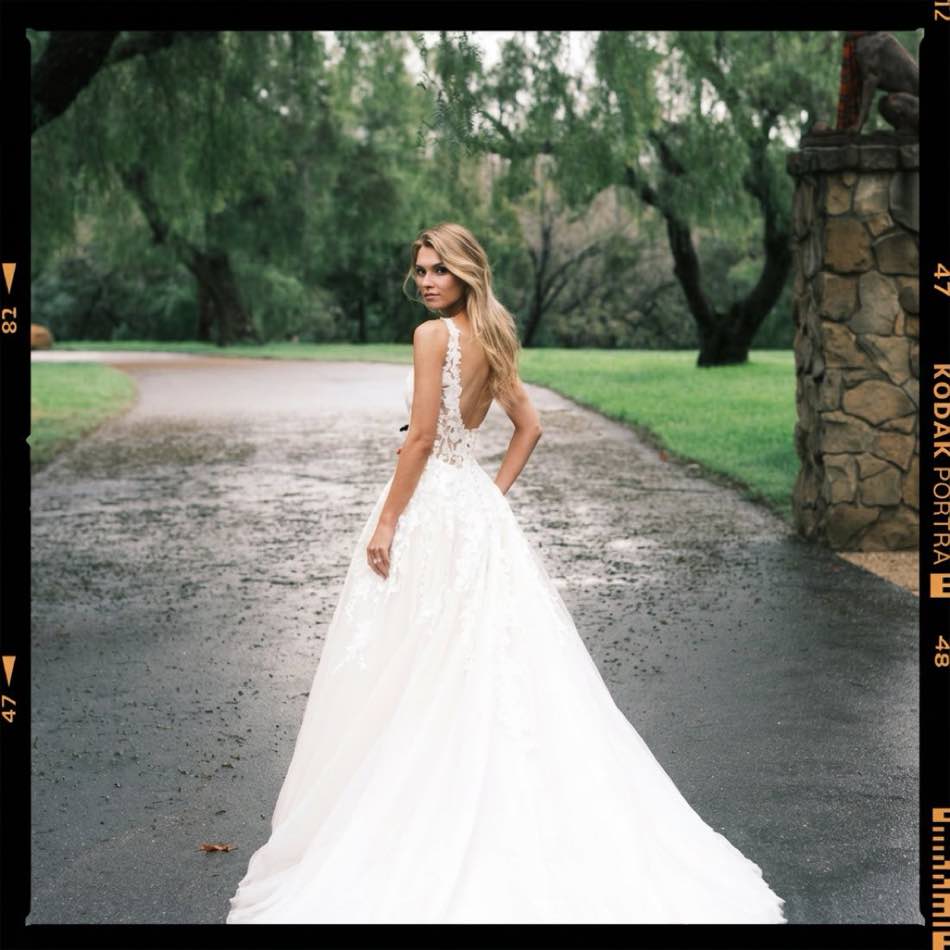 Bride walking on a forest path